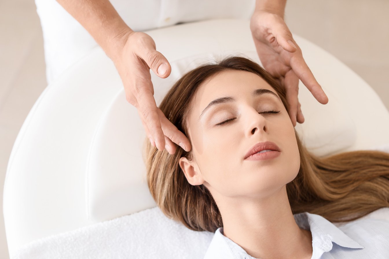 Reiki Master Working with Patient